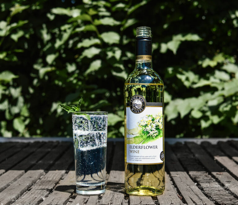 lyme bay winery elderflower wine bottle with long drink