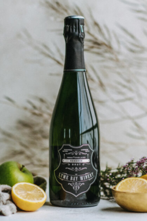 Lyme bay winery Reserve Brut NV bottle with fruits