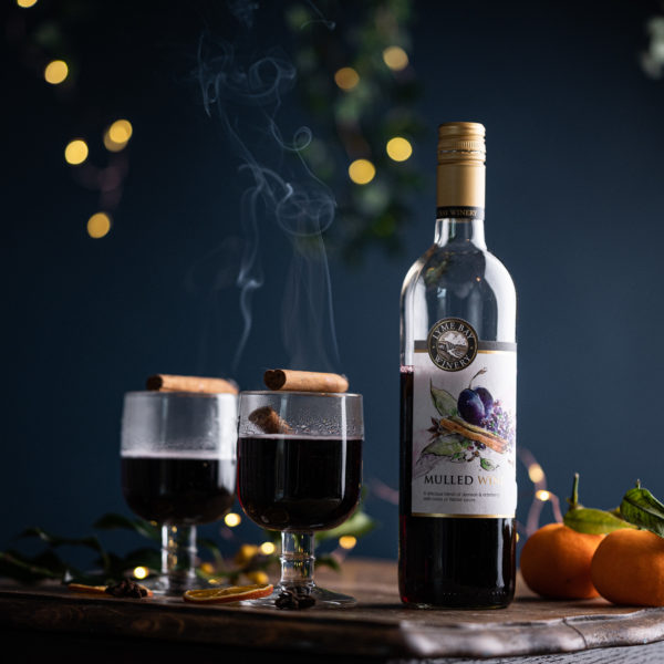 lyme bay winery mulled wine bottle with glasses