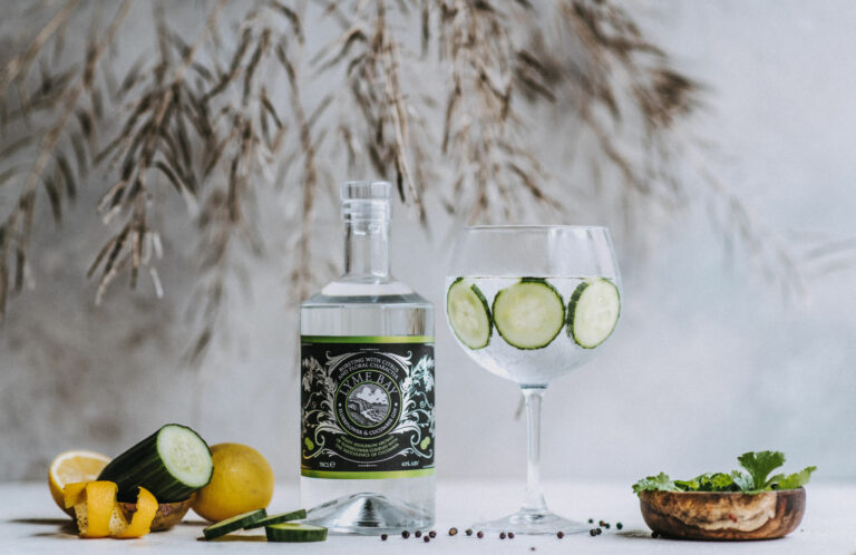 lyme bay winery elderflower and cucumber gin bottle with spices and fruits