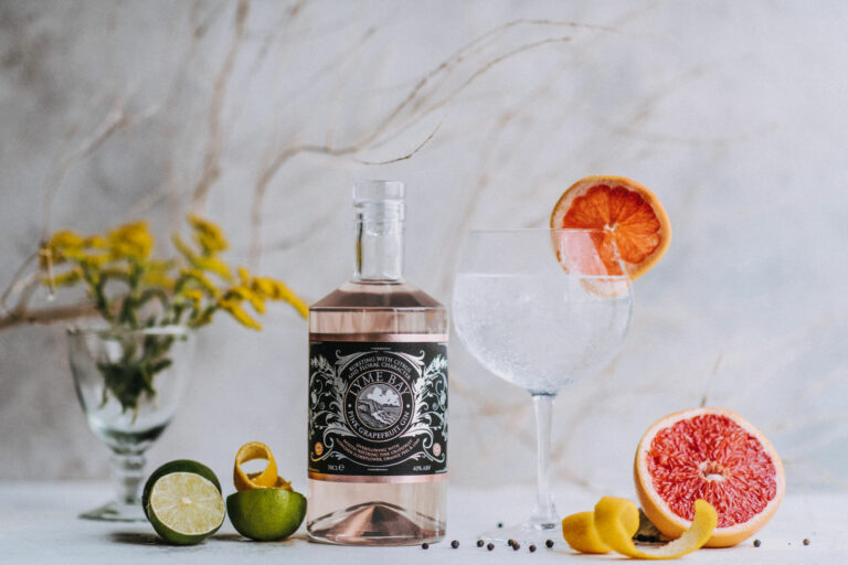 lyme bay winery pink grapefruit gin bottle with spices and fruits