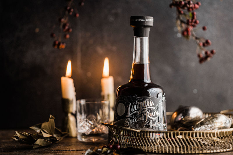 Lugger Rum bottle with a festive background
