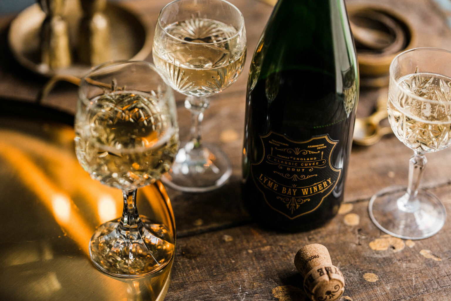 lyme bay winery classic cuvee brut bottle with glasses